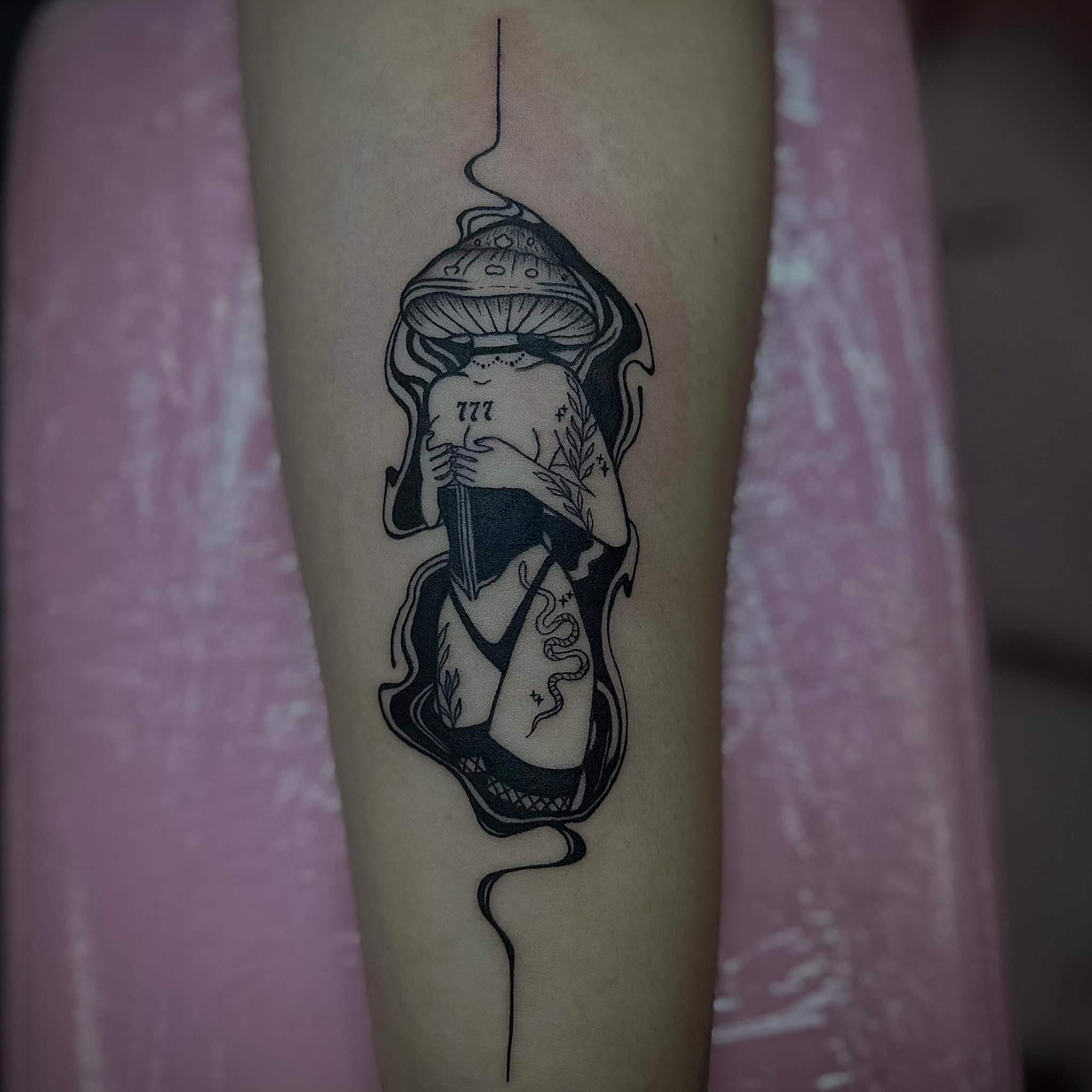 Mushroom and dagger black and grey tattoo on the forearm by Emily‹𝟹
