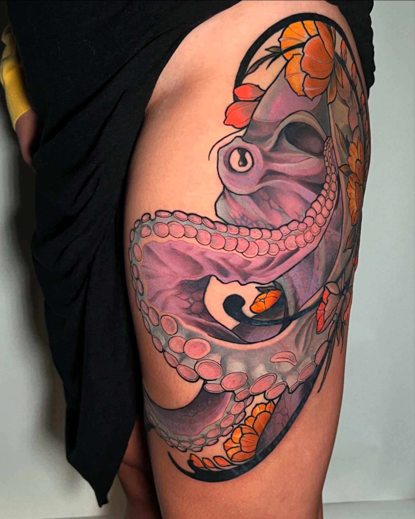Octopus realism tattoo on the thigh by Joshua Weeks