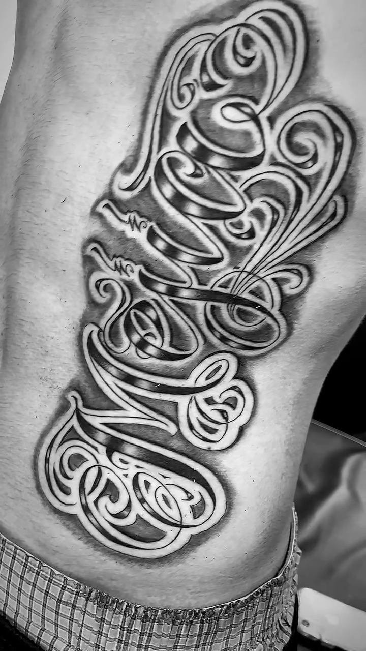 Tattoo by @twicetattoos β lettering_script, black_and_grey