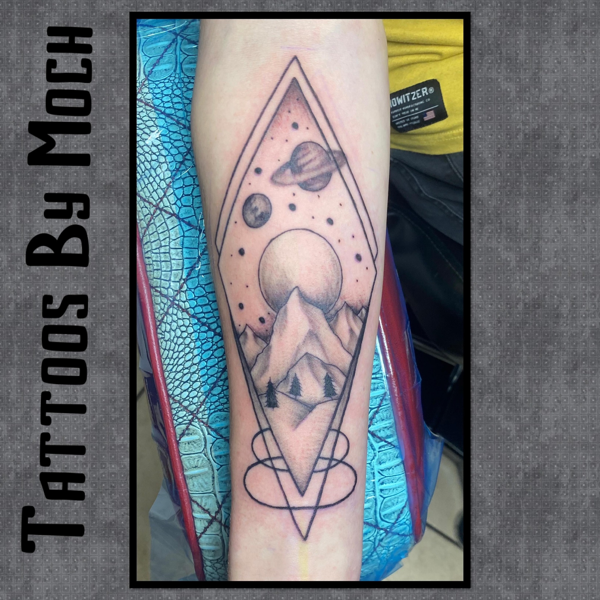 Geometric landscape geometric tattoo on the forearm by Tattoos By Moch, Toledo, Ohio