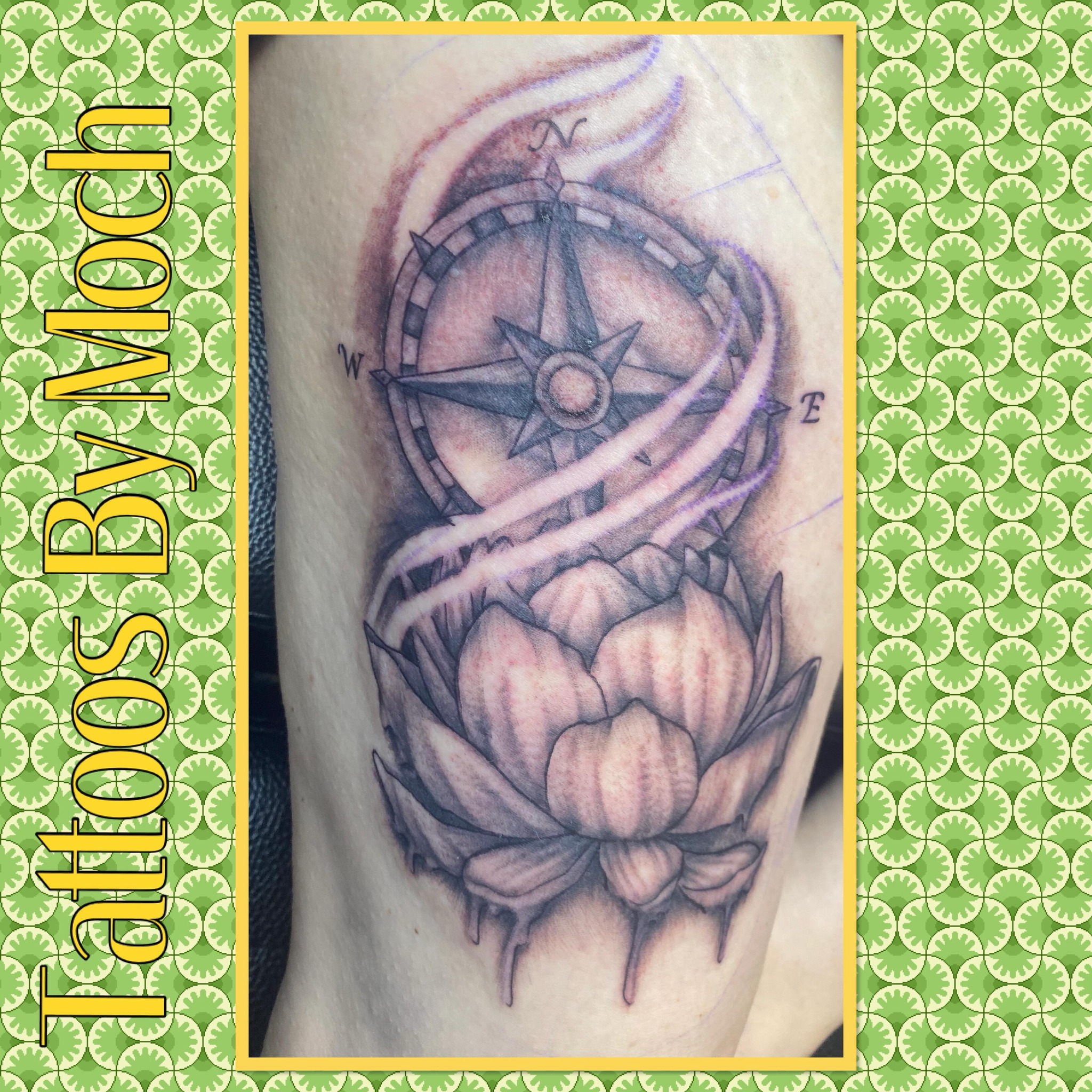 Lotus flower and compass realism tattoo on the forearm by Tattoos By Moch, Toledo, Ohio