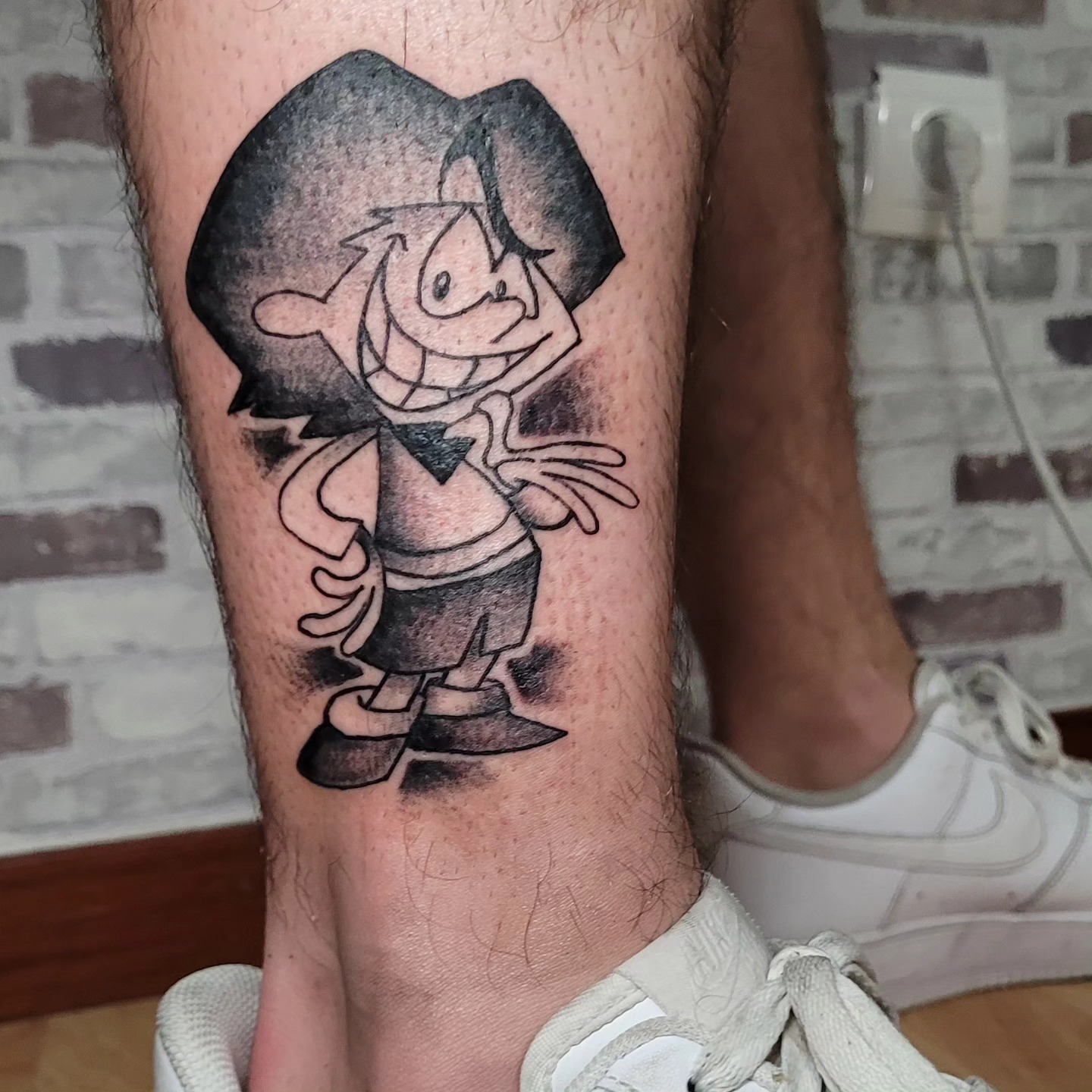 Astérix black and grey tattoo on the forearm by Gonzalo Pantona