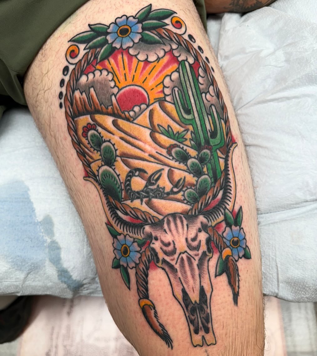Desert landscape American traditional tattoo on the thigh by Ethan Bennett