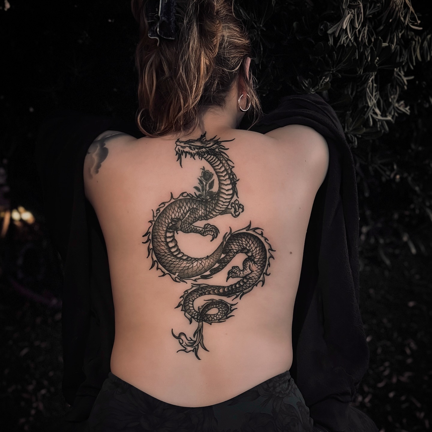 Dragon black and grey tattoo on the back by Steve