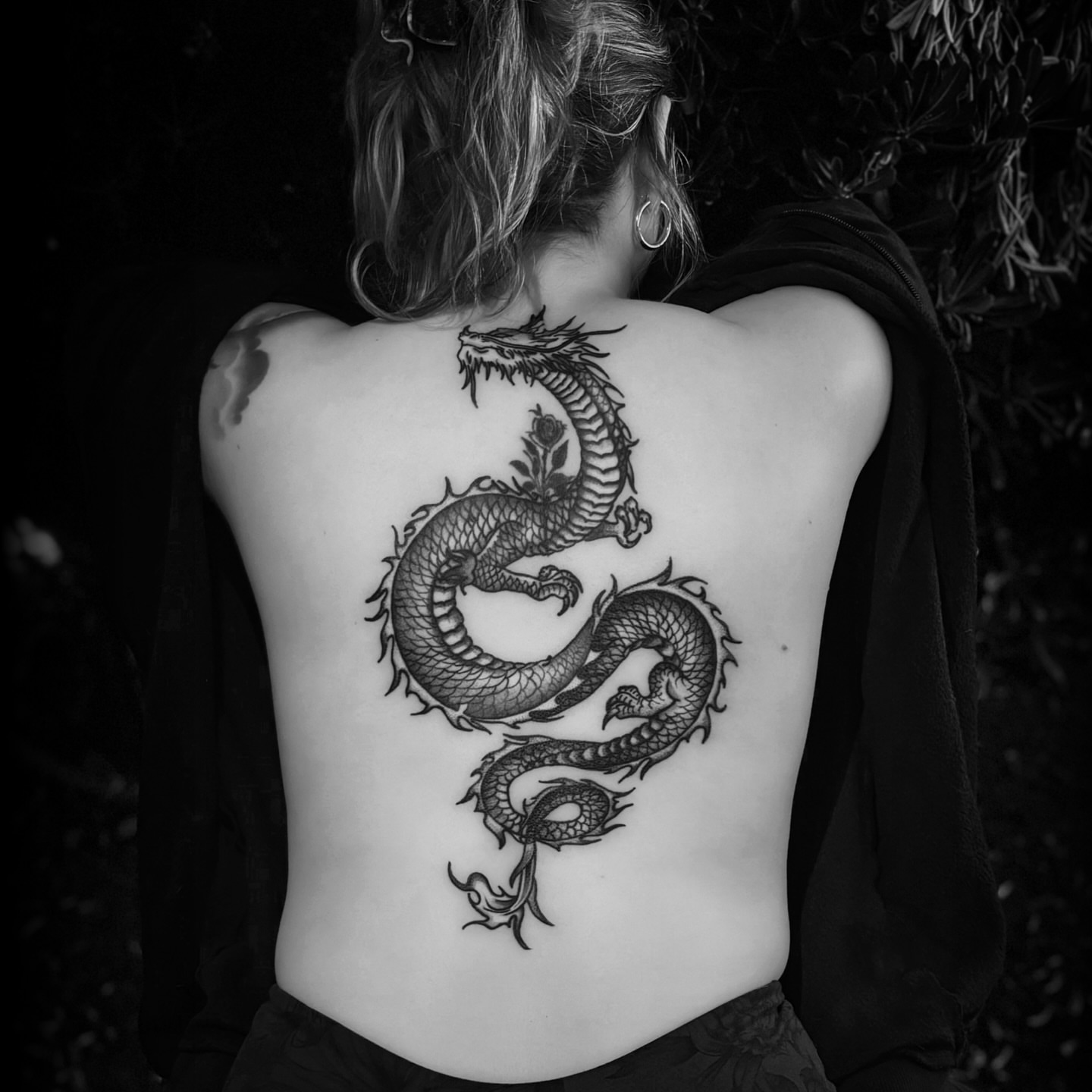 Dragon black and grey tattoo on the back by Steve