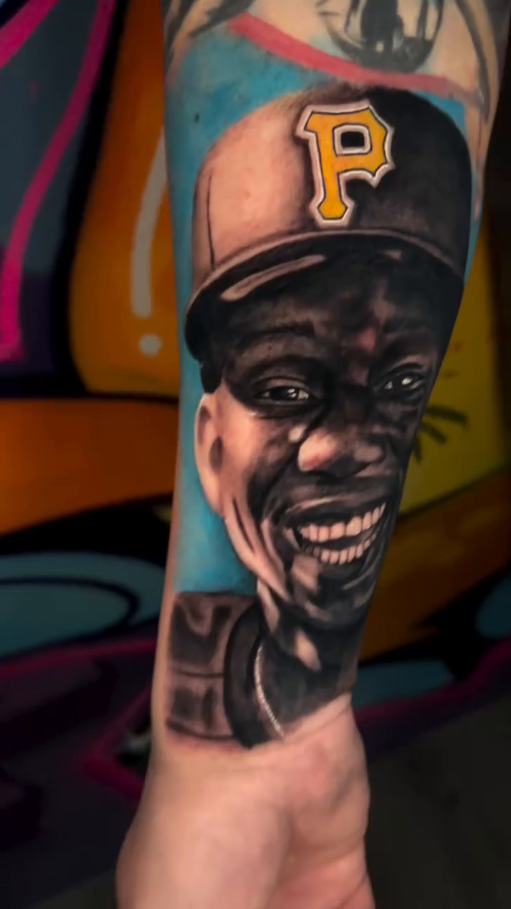 Man in baseball cap realism tattoo by Rafa