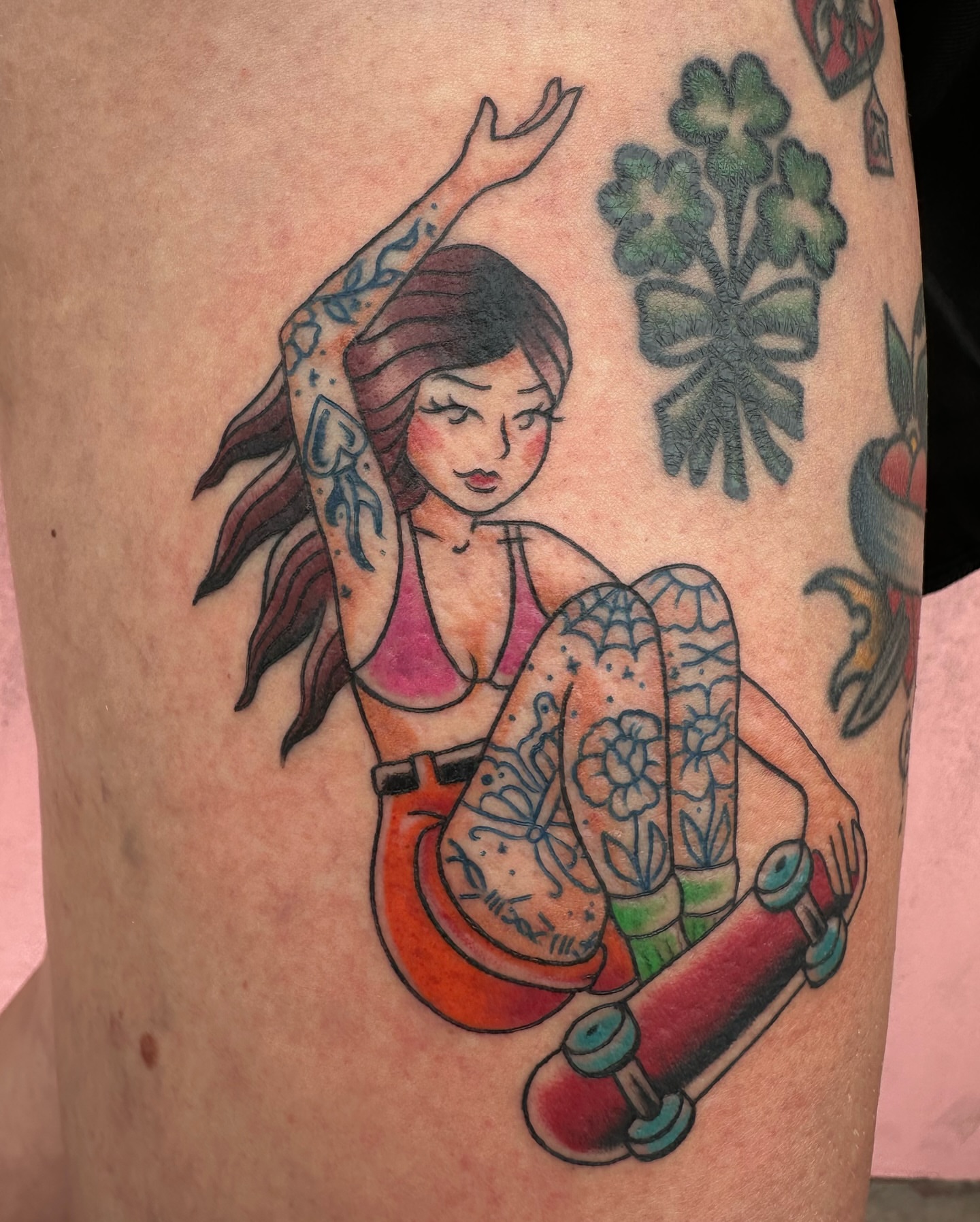 Skateboarding girl American traditional tattoo on the thigh by Savy Rasor, Austin, Texas