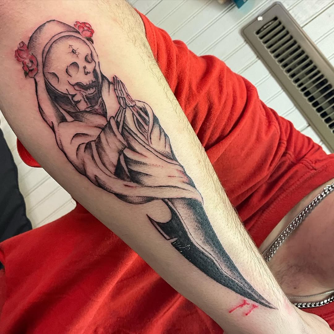 Grim reaper with knife realism tattoo on the forearm by Bear