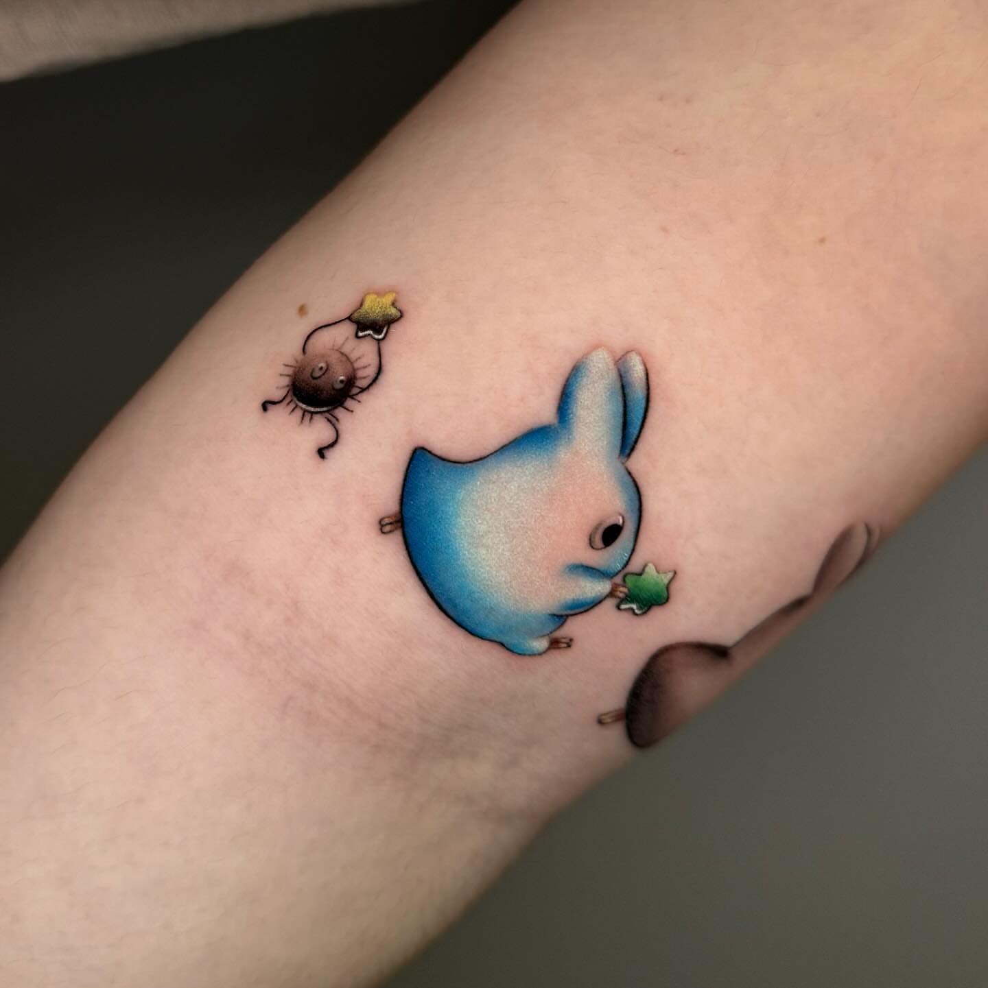 Blue rabbit dotwork tattoo on the forearm by Mel