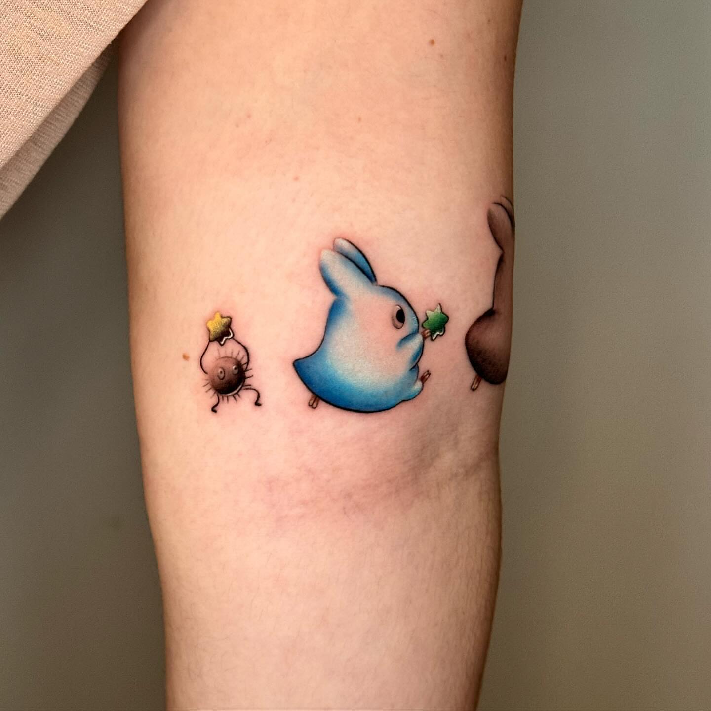 Rabbit and bug dotwork tattoo on the forearm by Mel