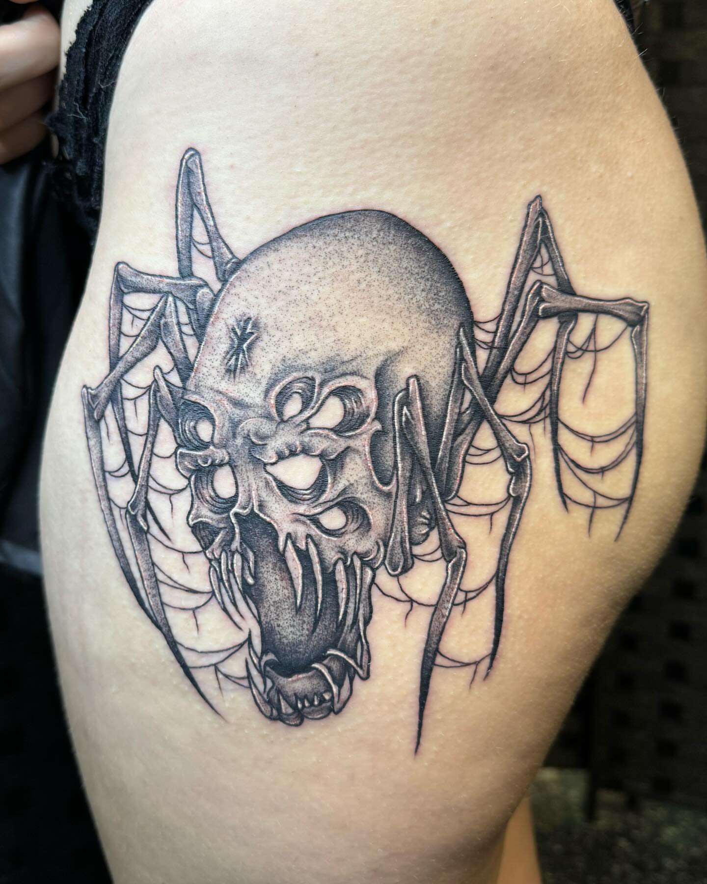 Skull realism tattoo on the thigh by Cory Perry-Servellon