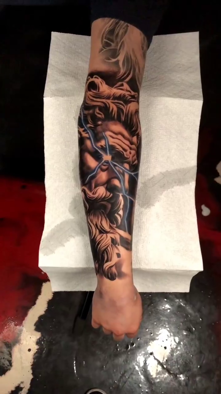 Lion and warrior realism tattoo by David "Mager" Torres