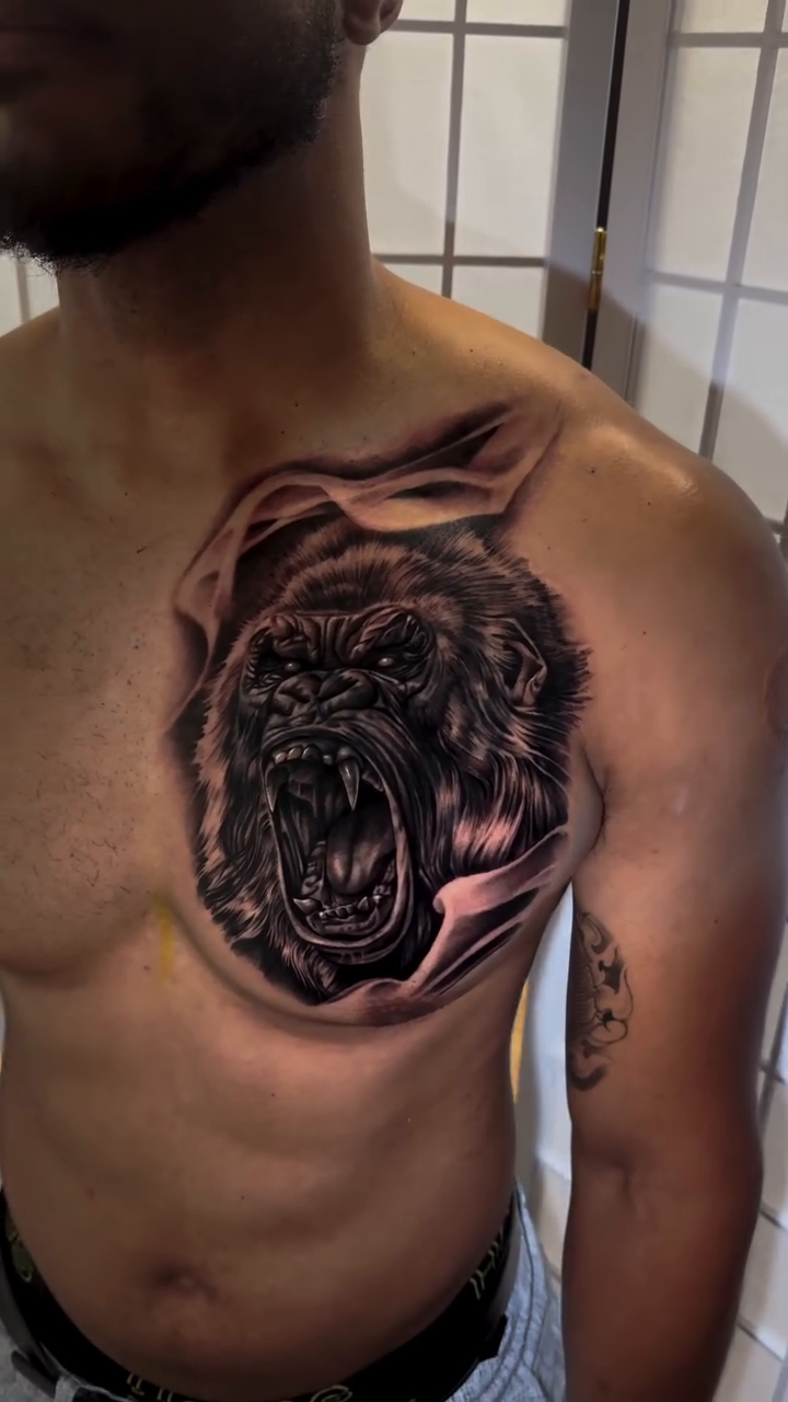 Gorilla portrait realism tattoo by Flamure Islami