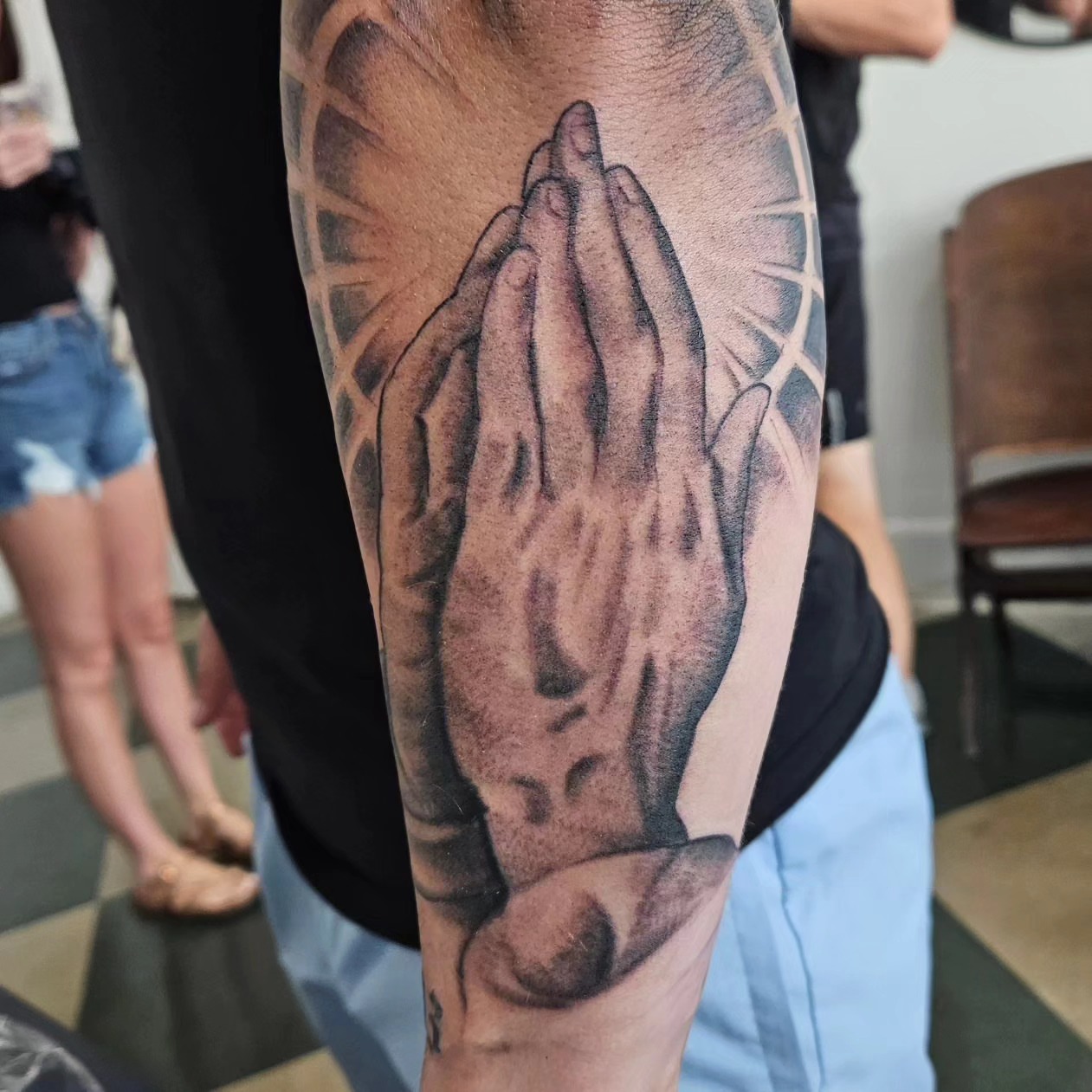 Praying hands realism tattoo on the forearm by David Nash, Evansville, Indiana