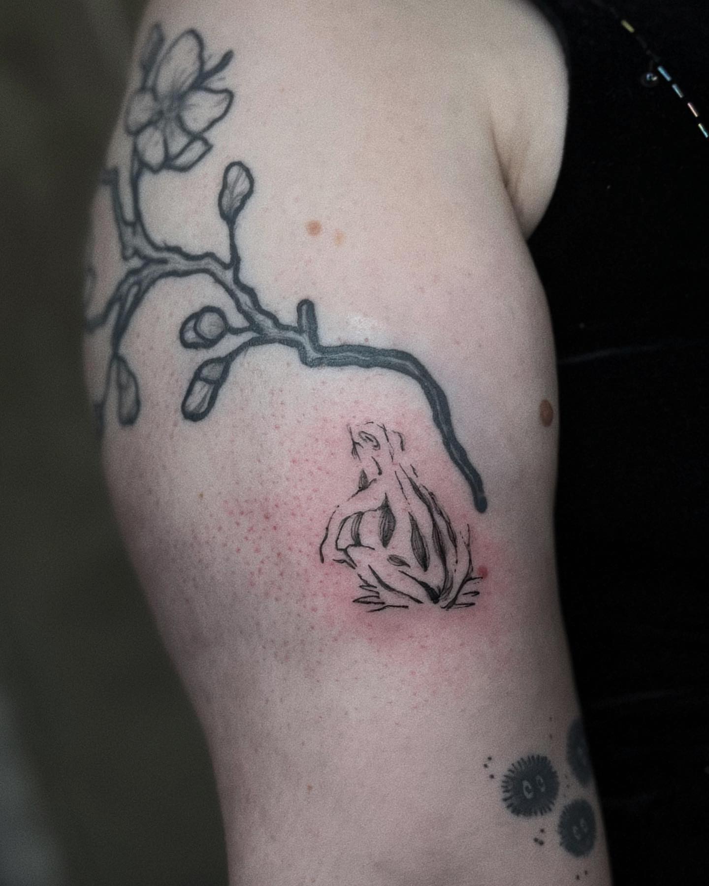 Cherry blossom and frog black and grey tattoo on the forearm by San Kang
