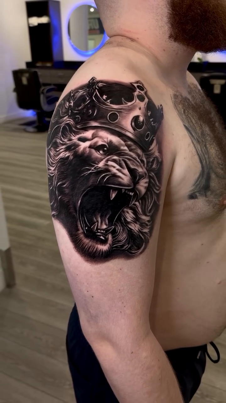 Lion with crown realism tattoo by Keebs