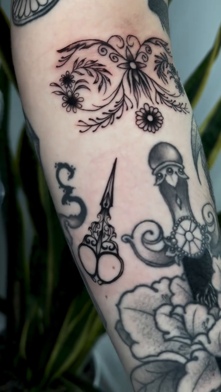 Scissors and flowers realism tattoo by ✮ Monarch Tattoos ✮