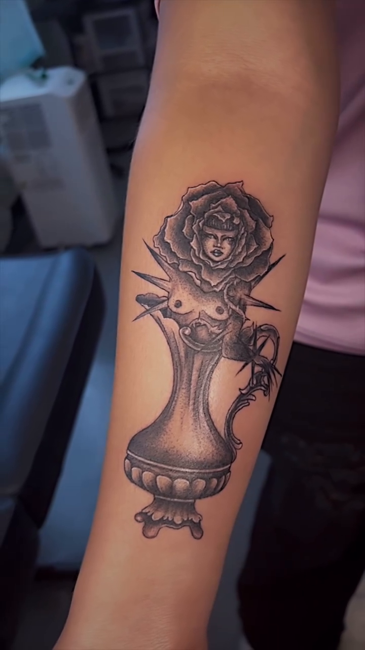 Surrealism tattoo on the forearm by Nikki Ward