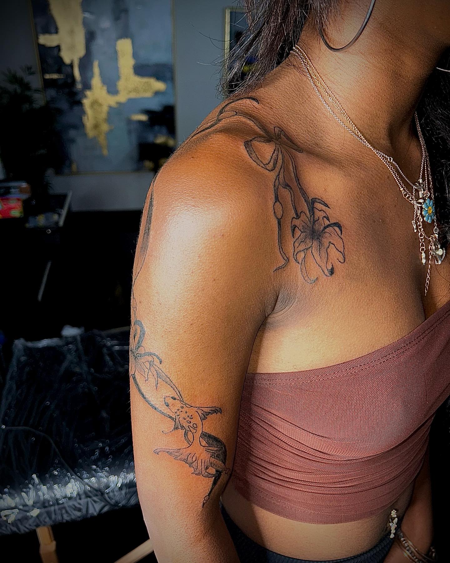 Flower and butterfly black and grey tattoo on the shoulder by Cleveland Tattoo Artist, Cleveland, Ohio