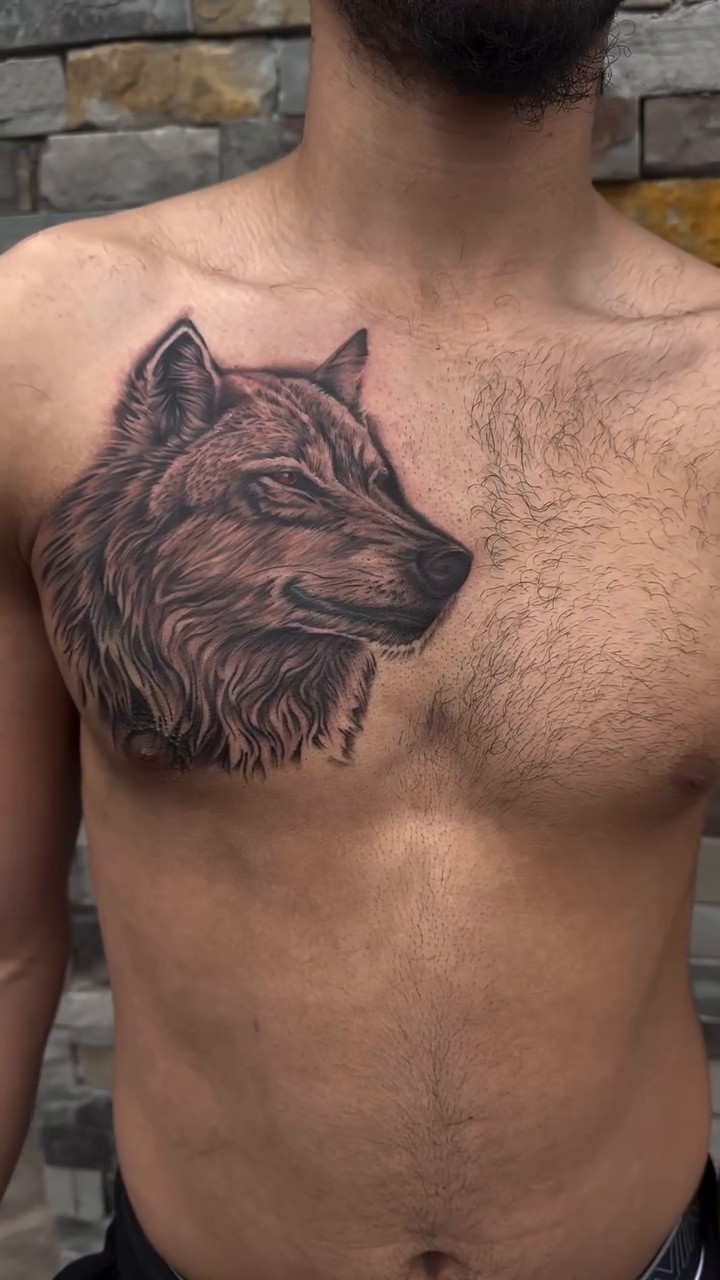 Wolf head realism tattoo by Dani B.