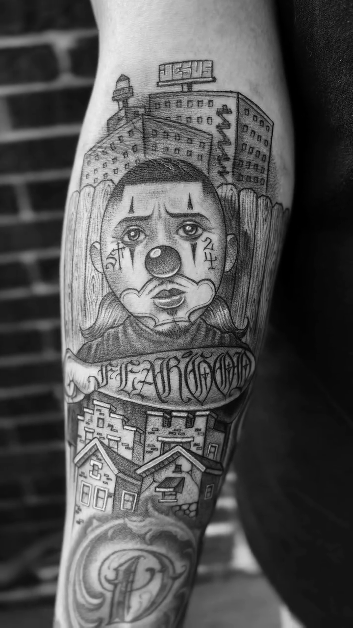 Sad clown and cityscape Chicano tattoo by F e A R