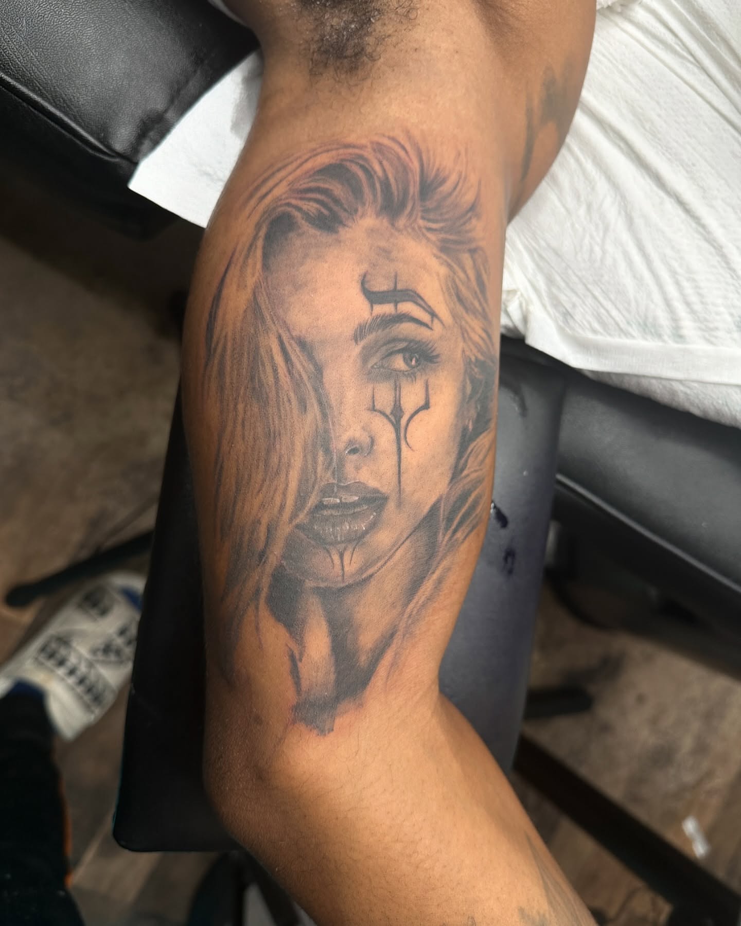 Woman's face realism tattoo on the forearm by Atl Tattoo Artist✍🏾👨🏾‍🎨