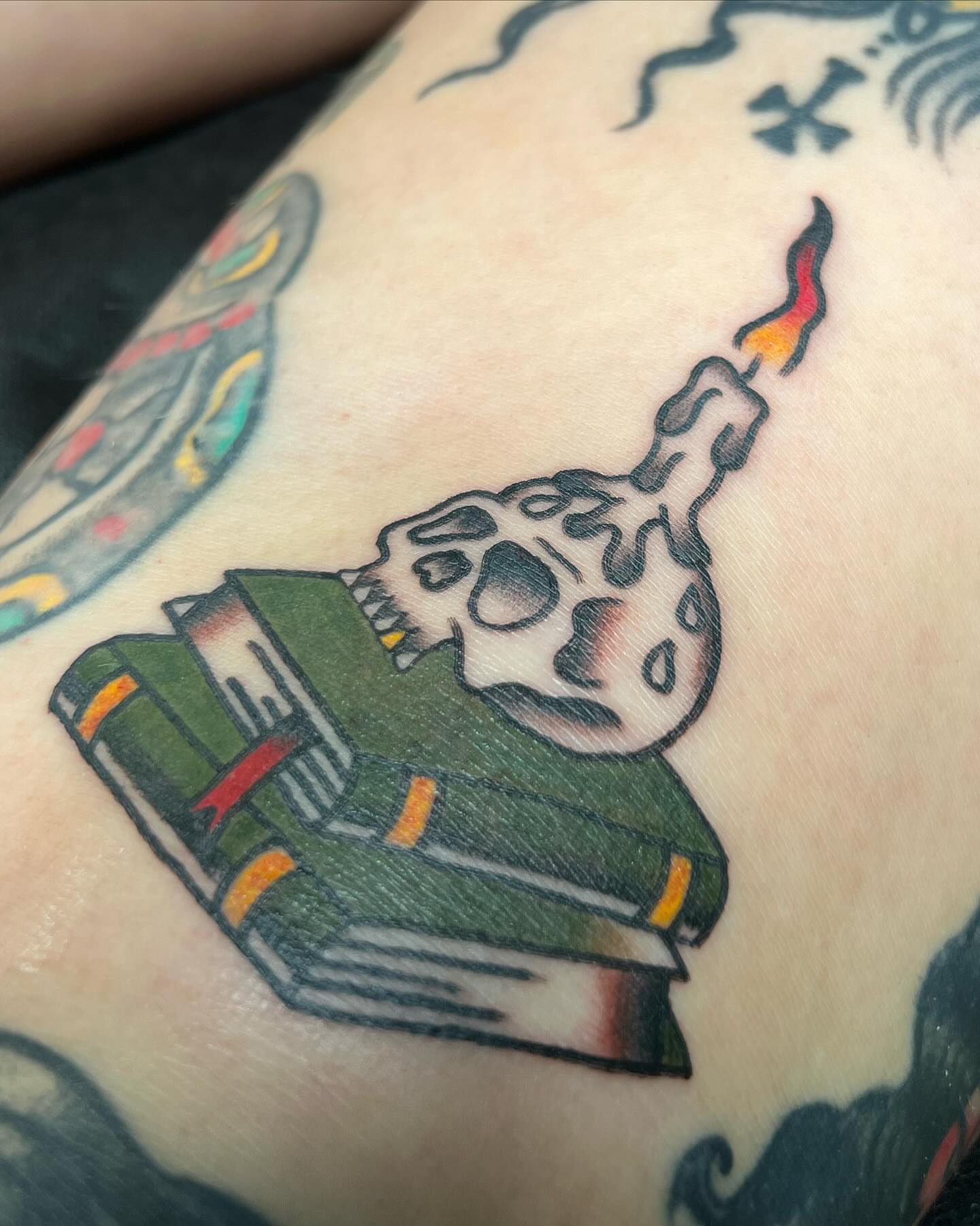Skull reading book American traditional tattoo on the forearm by ✮KAT✮