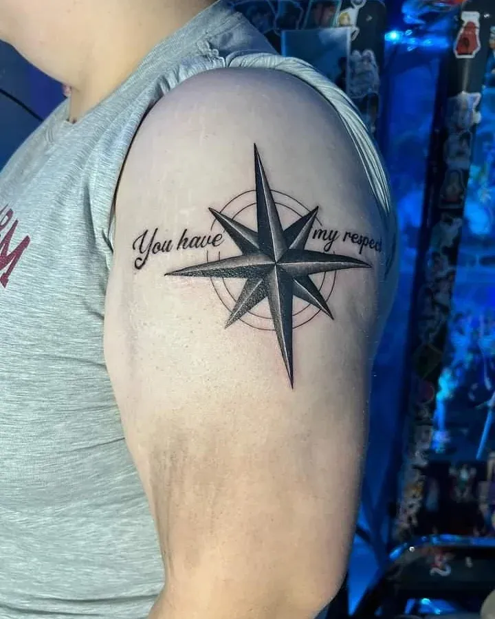 Compass star black and grey tattoo on the shoulder by Joc