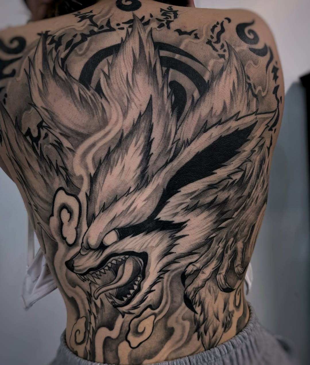 Nine-tailed fox anime tattoo on the back by Melissa "Lotuss" Chan