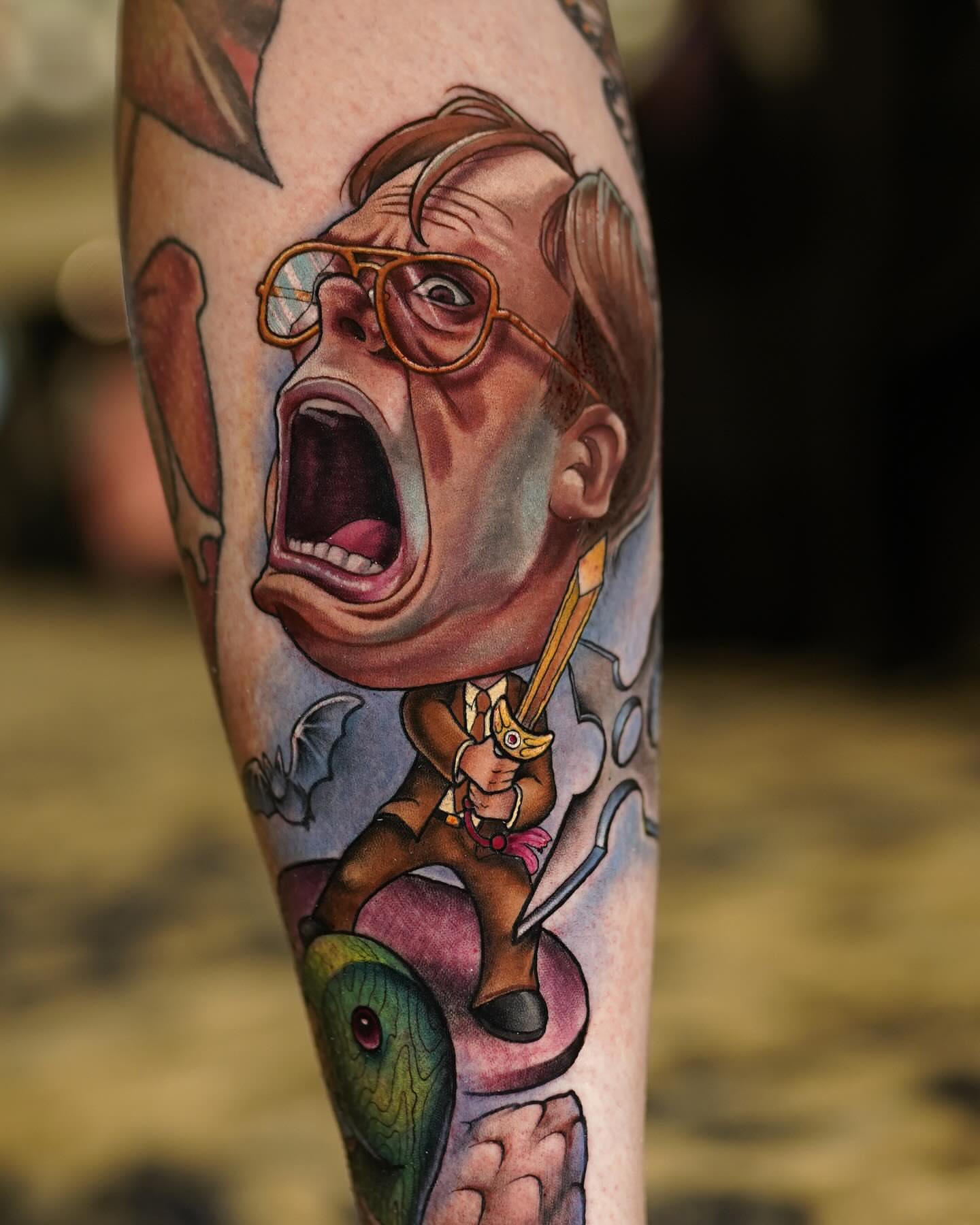 Elton John caricature realism tattoo on the forearm by Mary Blake Tattoos, Franklin, Tennessee