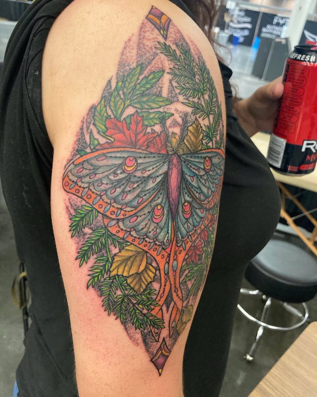 Moth and foliage dotwork tattoo on the shoulder by Madeline, Akron, Ohio