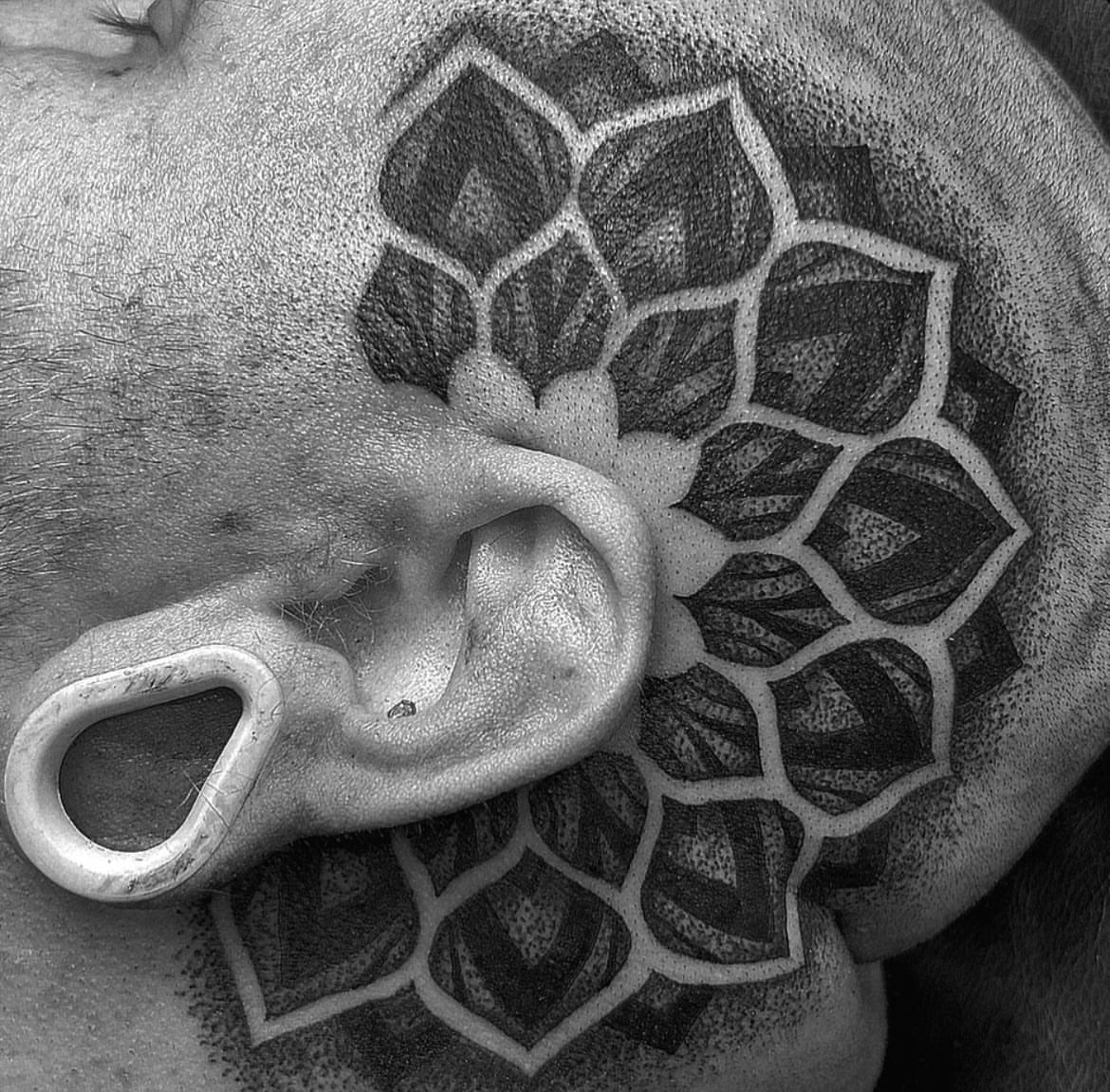 Geometric pattern dotwork tattoo on the head by Anna Nicole Thomas