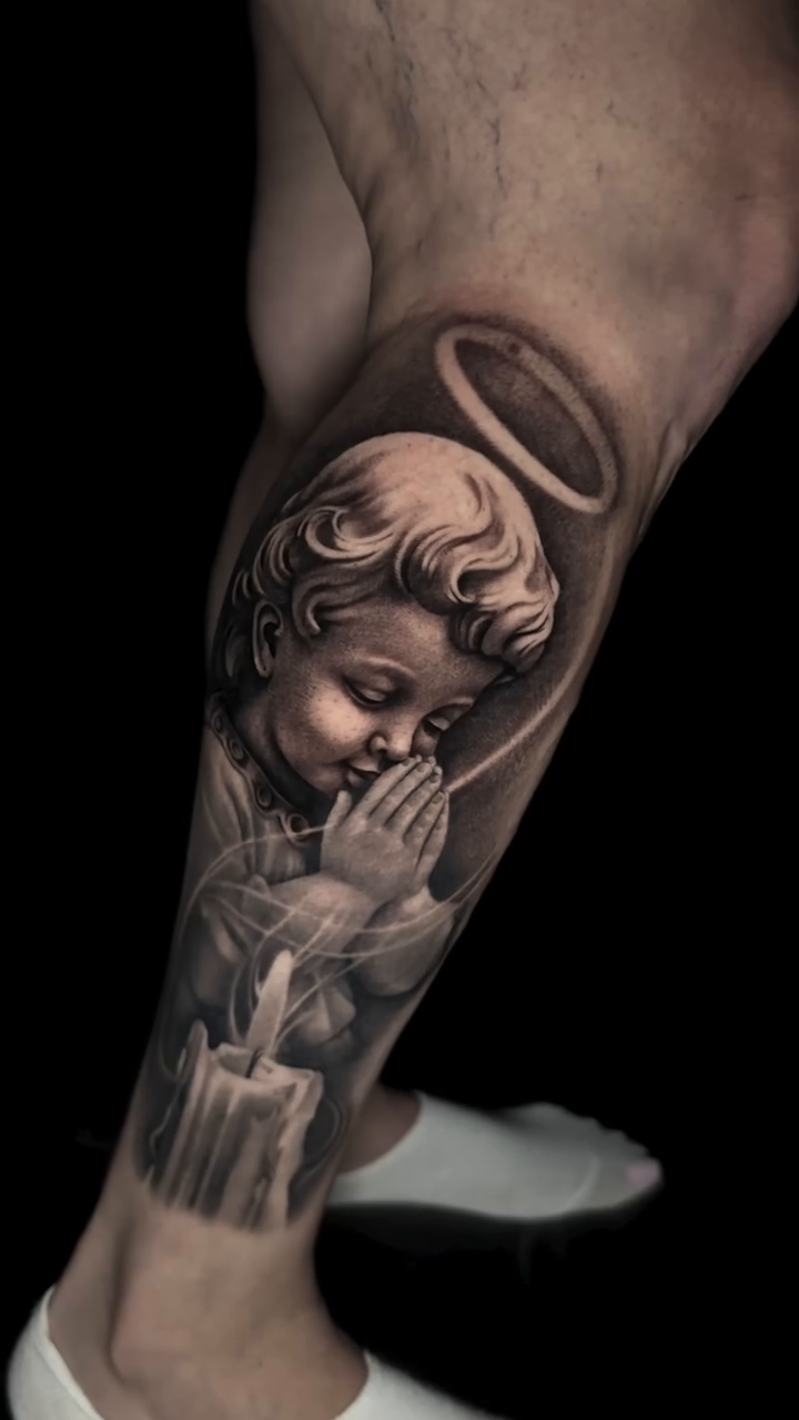 Cherub with candle realism tattoo by Ana Reyes