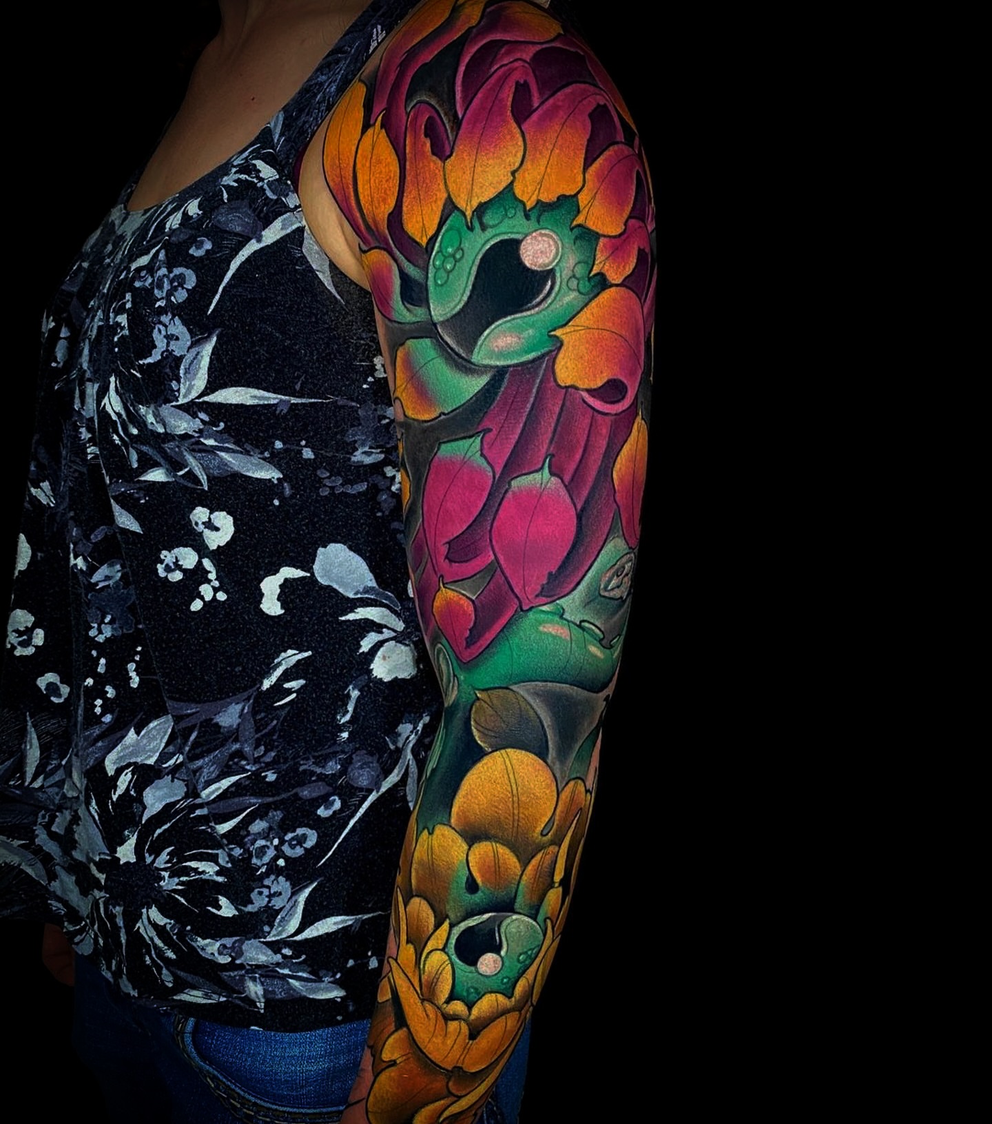 Floral arrangement new school tattoo on the upper arm by Ty Pallotta, Austin, Texas