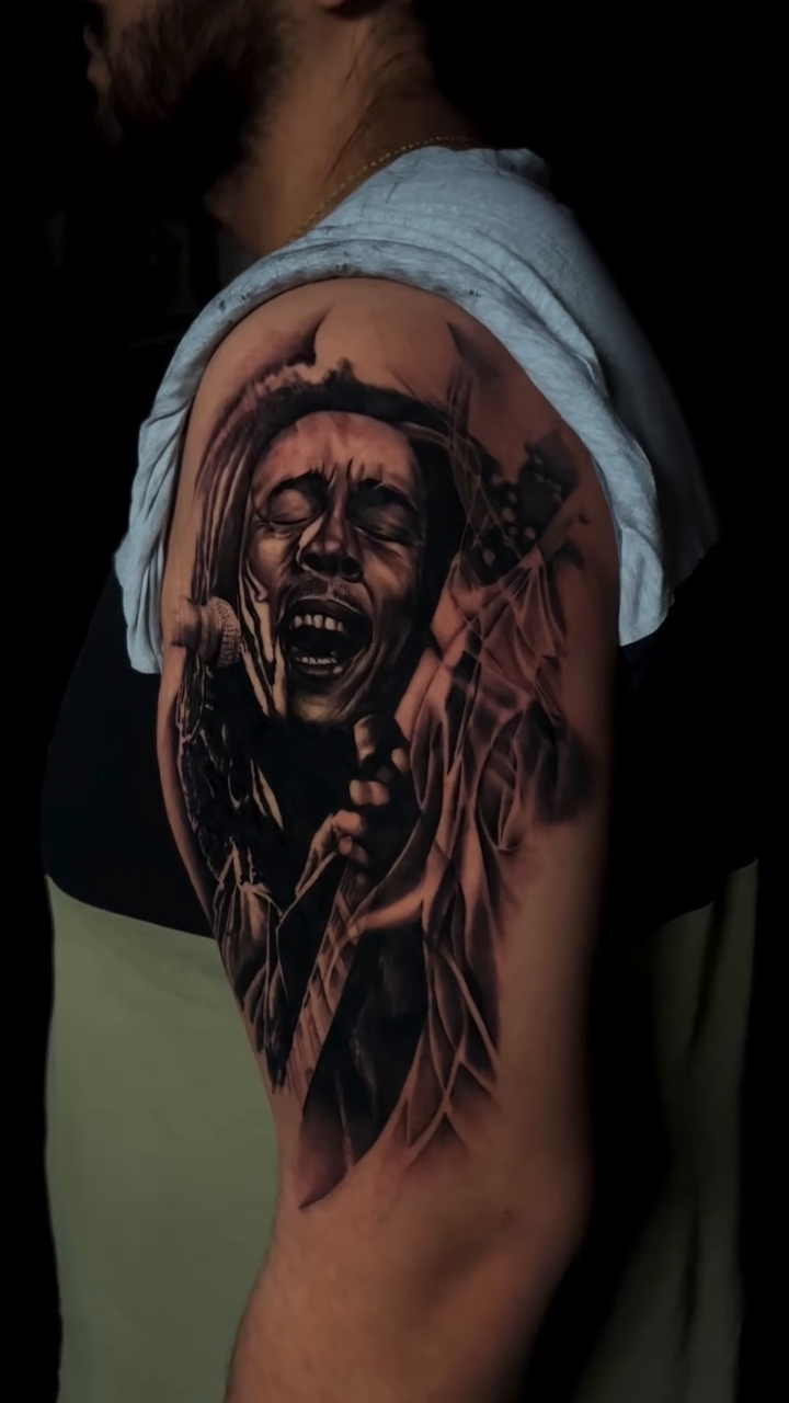Bob Marley portrait realism tattoo by Brayan Molina