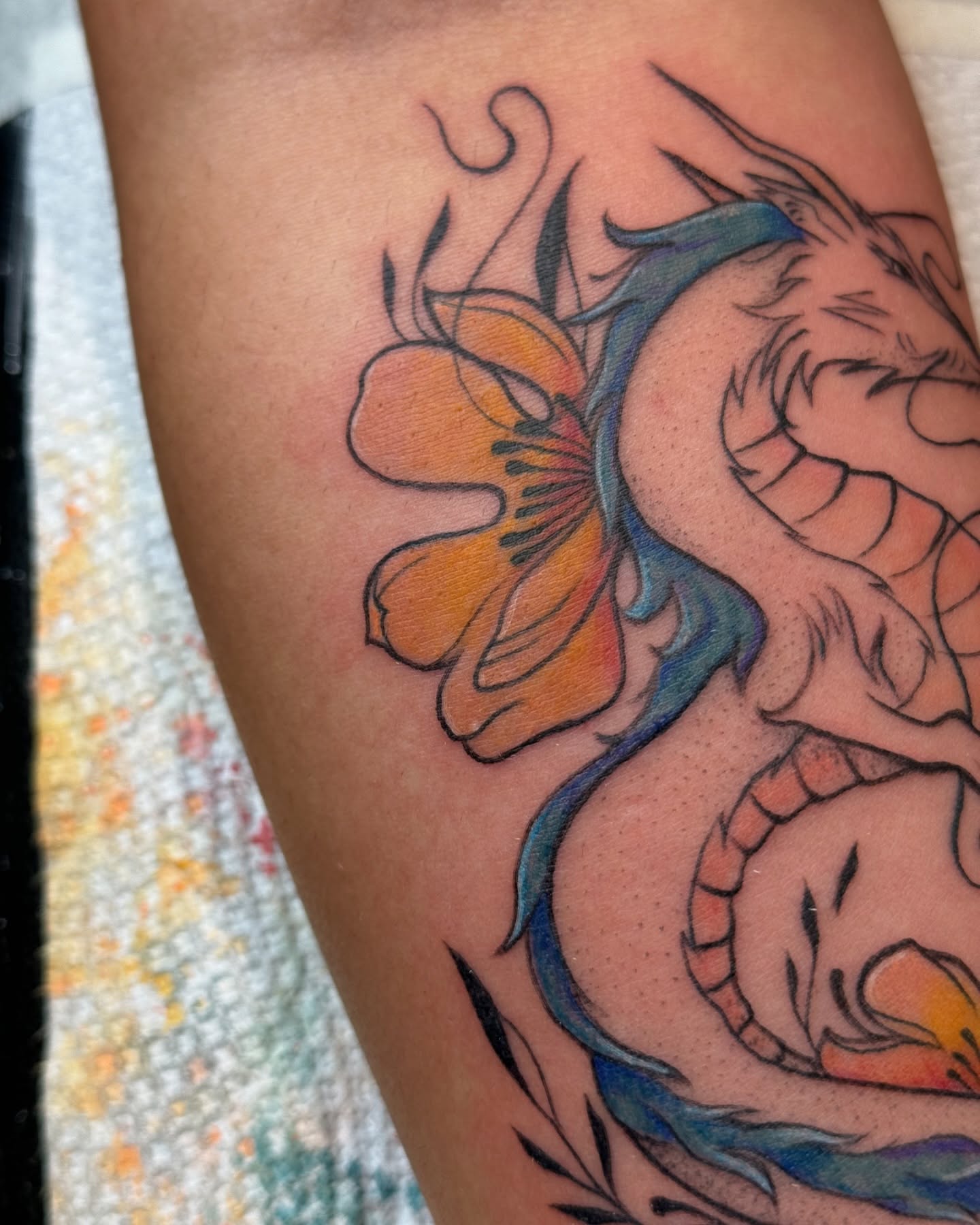 Dragon and flower new school tattoo on the thigh by Hailey K - Arizona Tattoo Artist, Miami, Florida