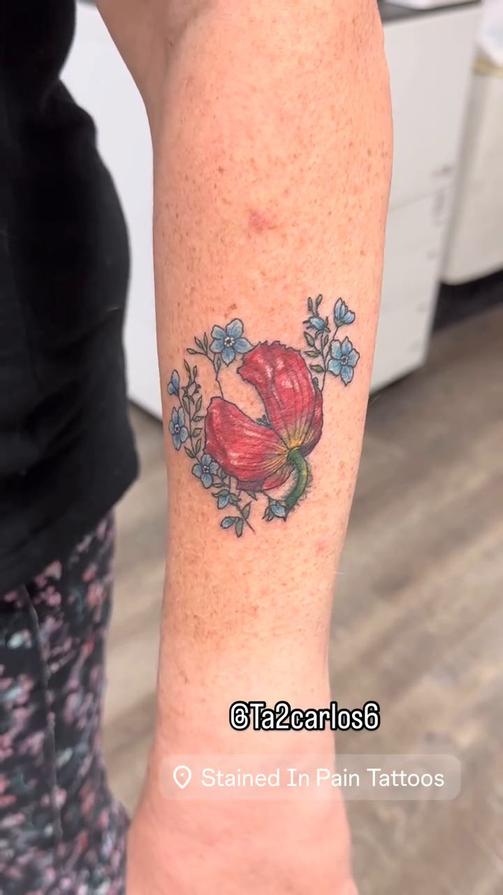 Tulip and forget-me-nots fine line tattoo by Juan c munoz jr, Chicago, Illinois