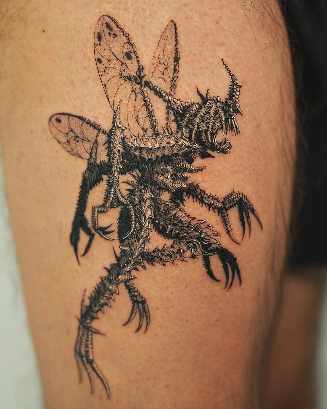 Tattoo by @nowthisyujhi — black_and_grey, realism