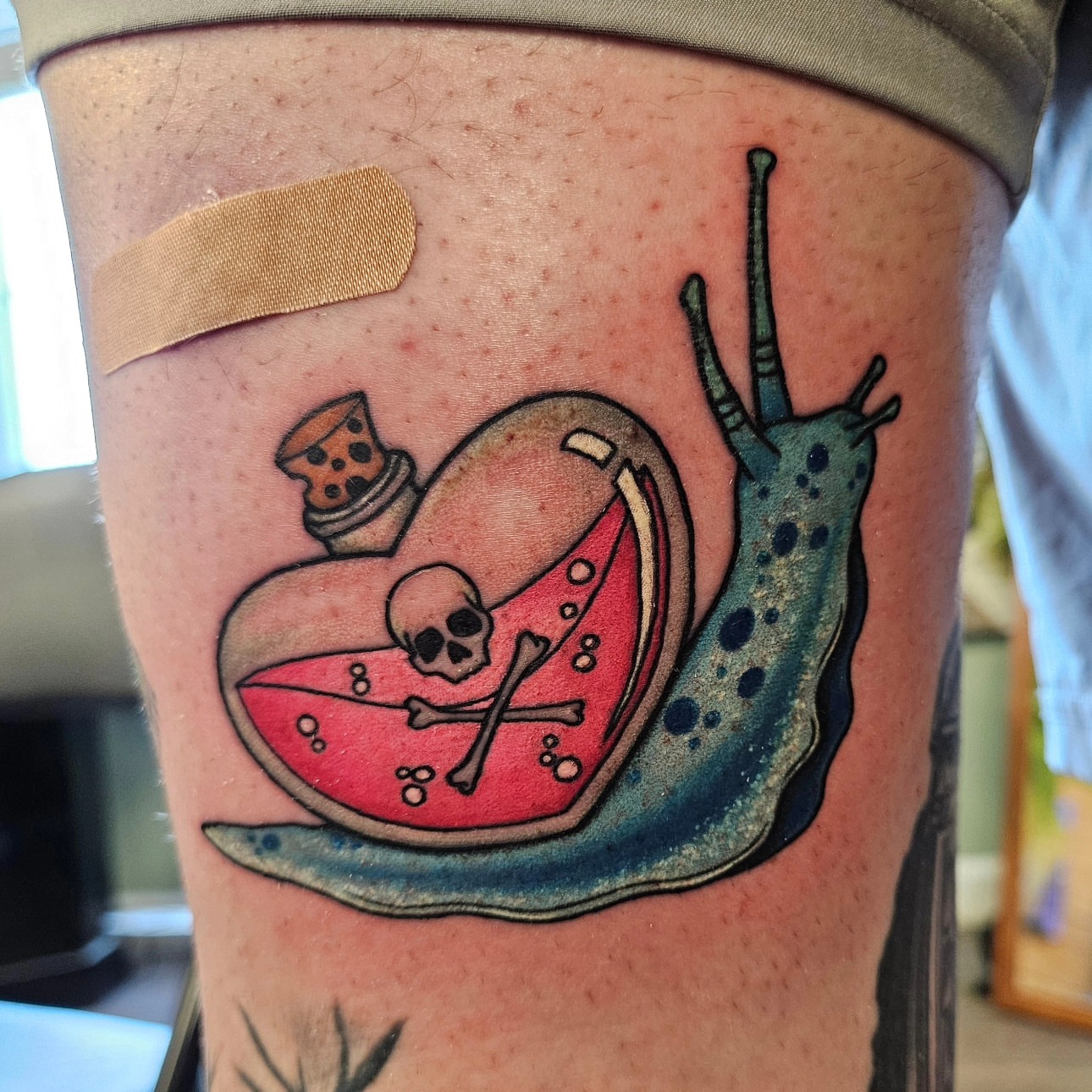Snail with poison bottle dotwork tattoo on the thigh by Nicole Bett