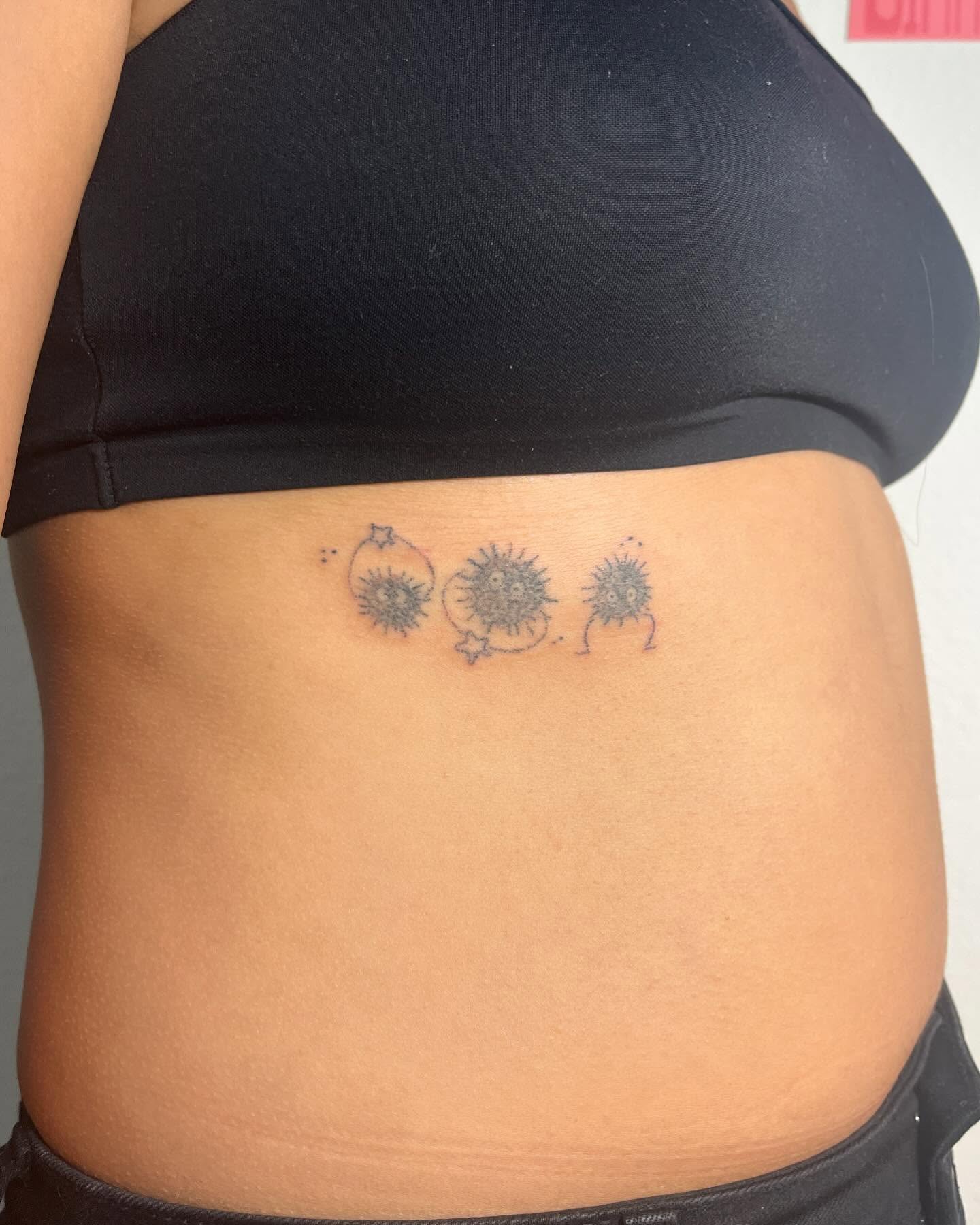 Three spiky creatures dotwork tattoo on the ribs by hana