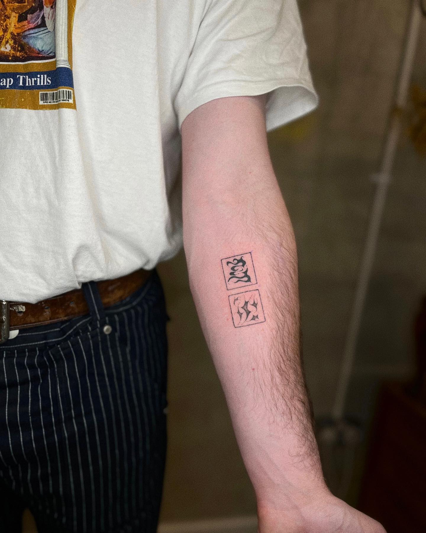 Numbers black and grey tattoo on the forearm by San Kang