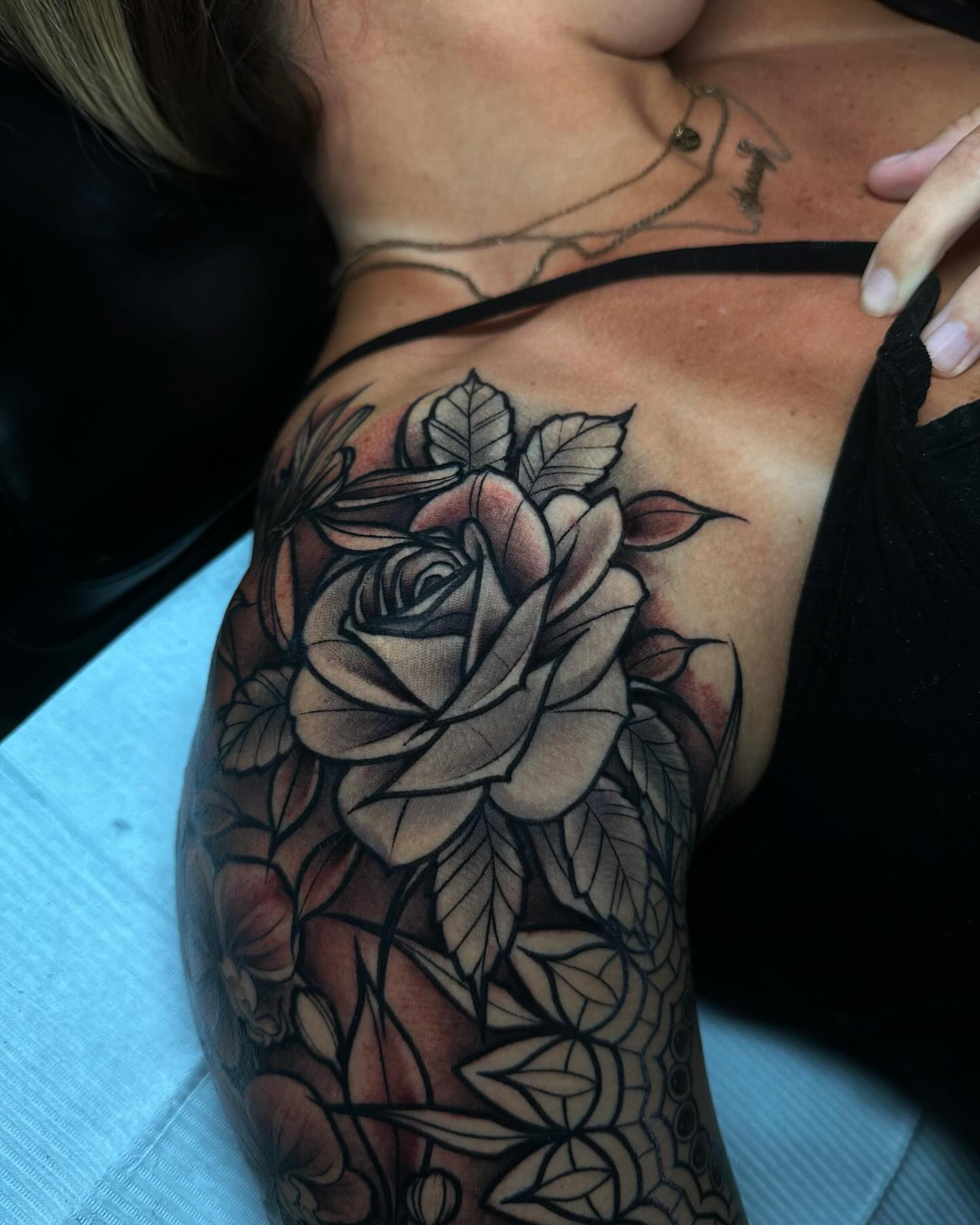 Rose black and grey tattoo on the shoulder by Ryan K Severe