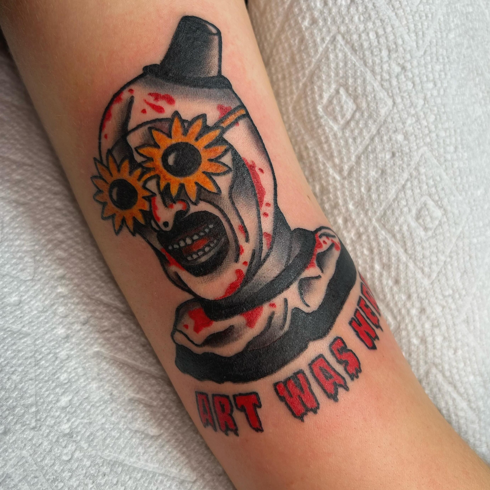 Spray can with sunflowers American traditional tattoo on the forearm by Lauren Caldwell 🔮🌙