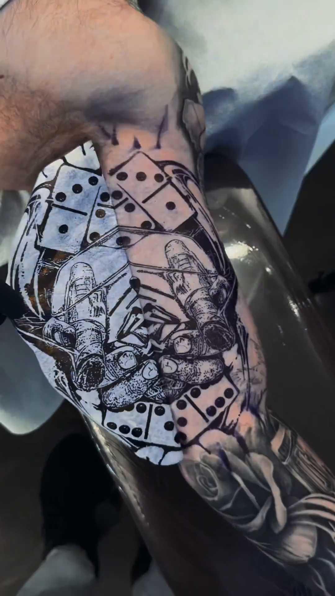 Figure and dice realism tattoo by Nick Stratt