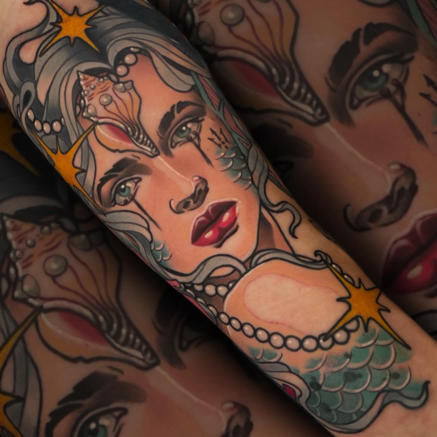 Mermaid American traditional tattoo on the forearm by Nathan Mickle