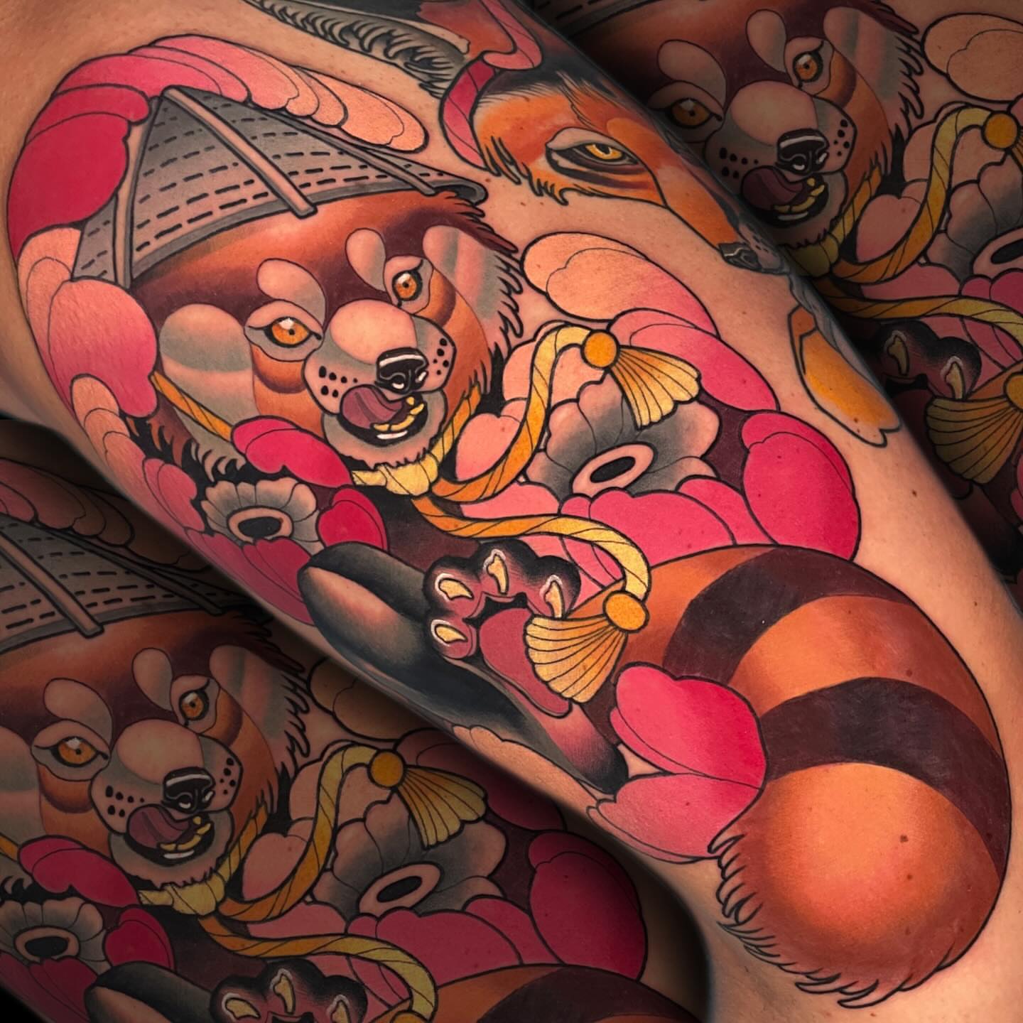 Lion and flowers American traditional tattoo on the forearm by Nathan Mickle