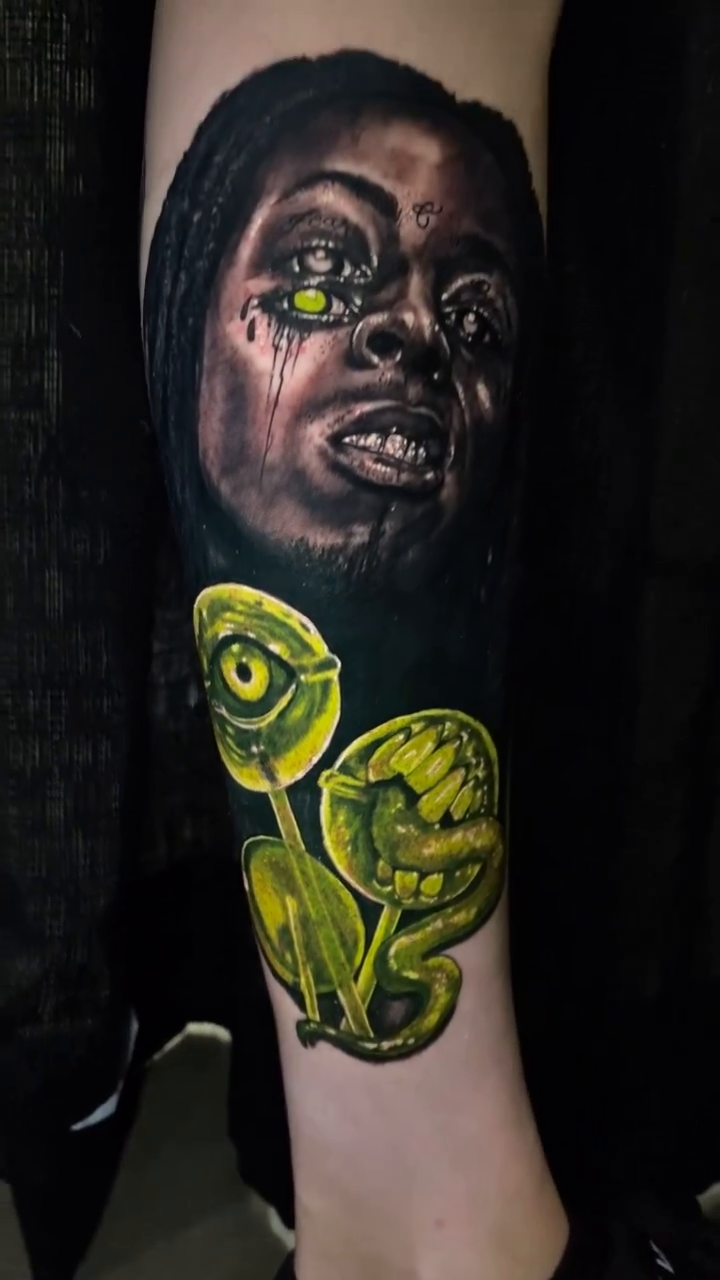 Woman with surreal flowers realism tattoo by Caitlyn Campbell