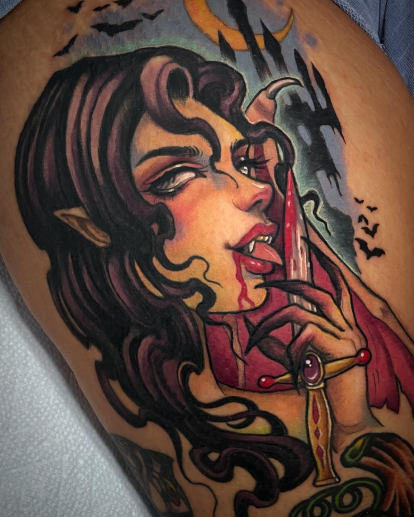 Woman with sword American traditional tattoo on the thigh by Leah Marie, Cincinnati
