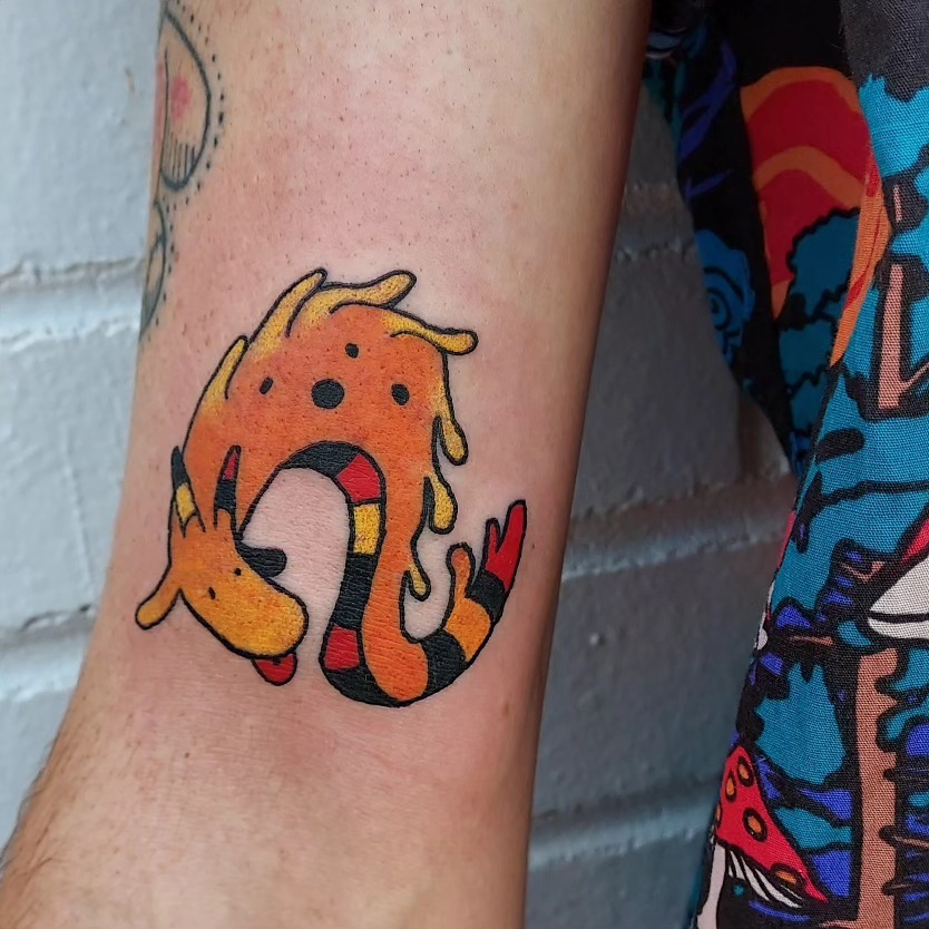 Dog dotwork tattoo on the forearm by Spike Cameron