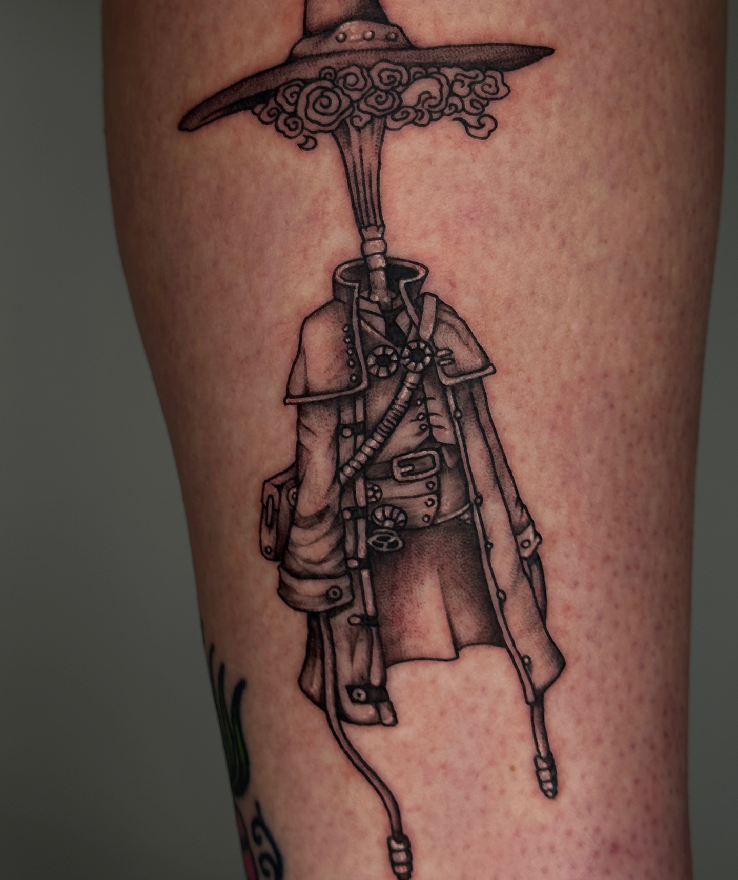 Steampunk figure black and grey tattoo on the forearm by A L e X